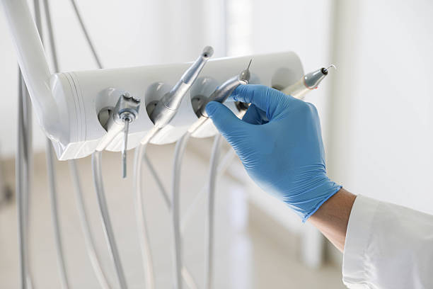 Professional Tooth Extraction technician working in Godley, TX